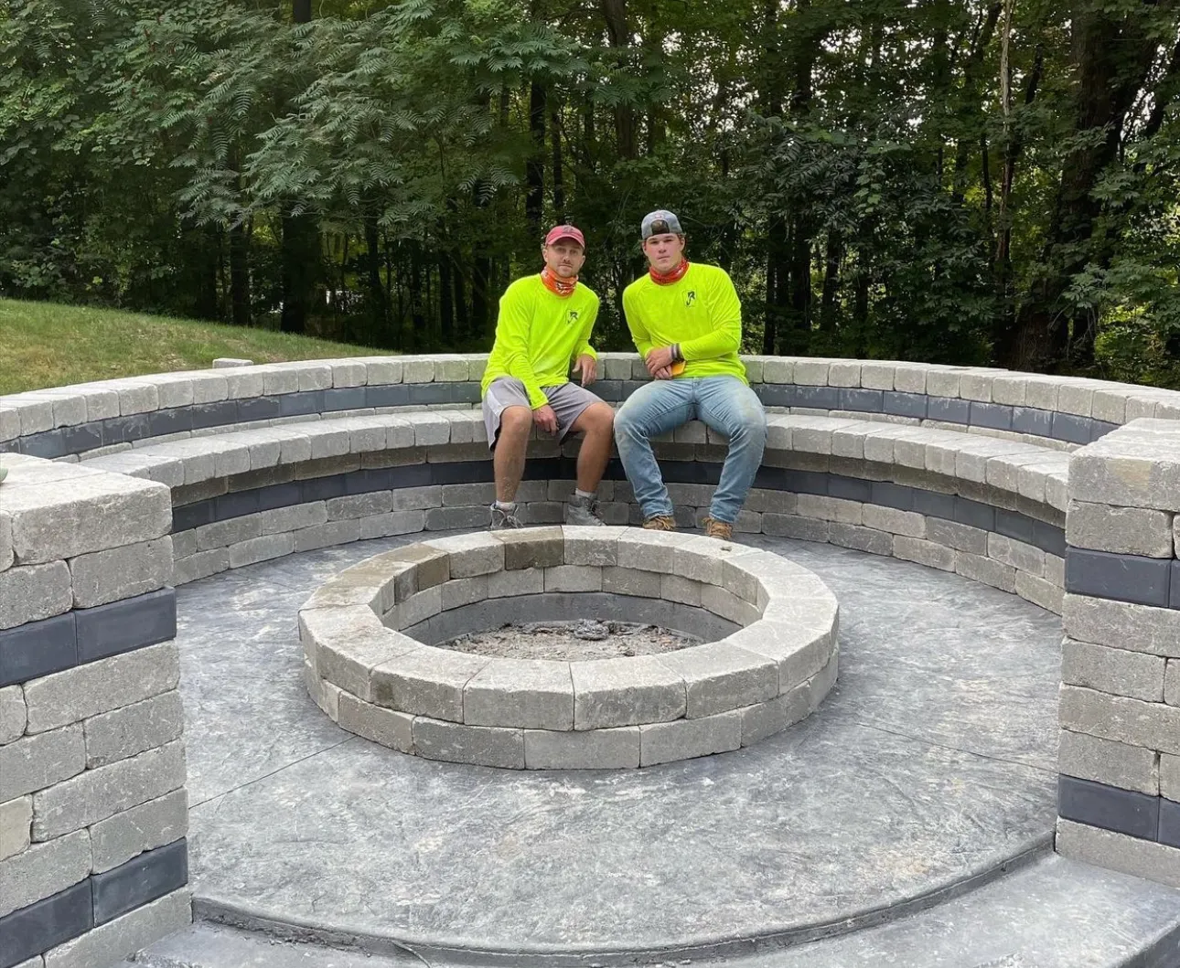 The Randolph Construction crew at a completed fire pit and seating area in Wadsworth, Ohio